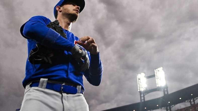 Jul 29, 2023; St. Louis, Missouri, USA;  Chicago Cubs first baseman Cody Bellinger (24) walks off the field after the first inning against the St. Louis Cardinals at Busch Stadium. Mandatory Credit: Jeff Curry-USA TODAY Sports