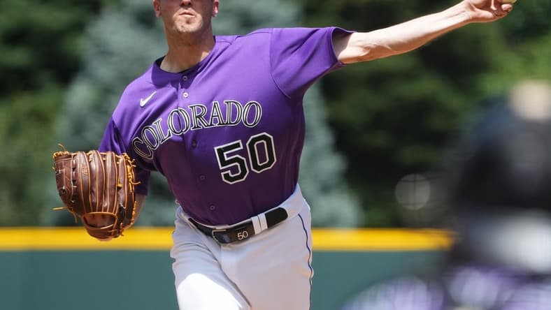 Jul 30, 2023; Denver, Colorado, USA; Colorado Rockies starting pitcher Ty Blach (50) pitches in the first inning against the Oakland Athletics at Coors Field. Mandatory Credit: Ron Chenoy-USA TODAY Sports