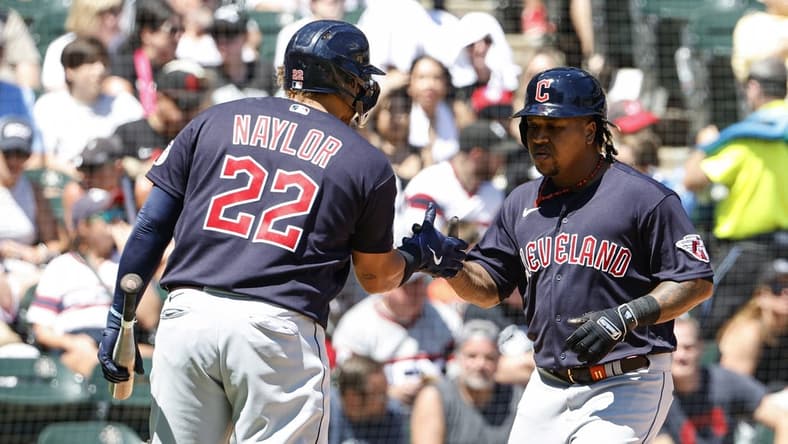 Jul 30, 2023; Chicago, Illinois, USA; Cleveland Guardians third baseman Jose Ramirez (11) celebrates with first baseman Josh Naylor (22) after hitting a solo home run against the Chicago White Sox during the fifth inning at Guaranteed Rate Field. Mandatory Credit: Kamil Krzaczynski-USA TODAY Sports