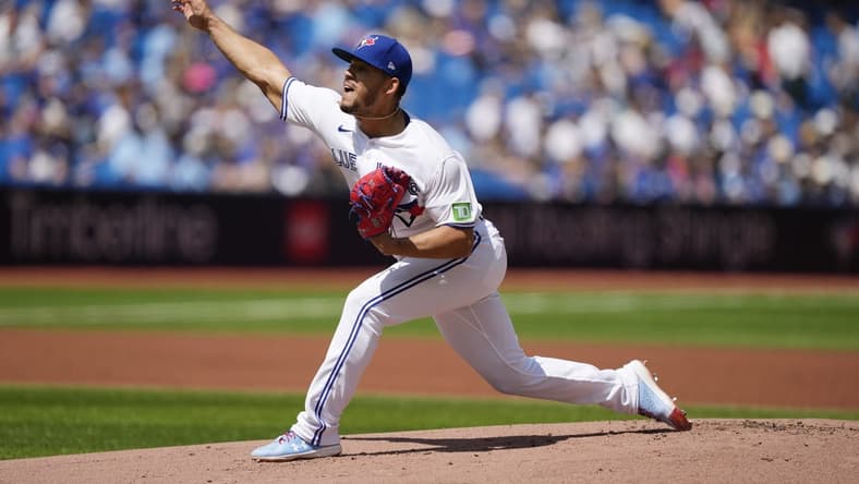Jul 30, 2023; Toronto, Ontario, CAN; Toronto Blue Jays starting pitcher Jose Berrios (17) pitches to the Los Angeles Angels during the first inning at Rogers Centre. Mandatory Credit: John E. Sokolowski-USA TODAY Sports