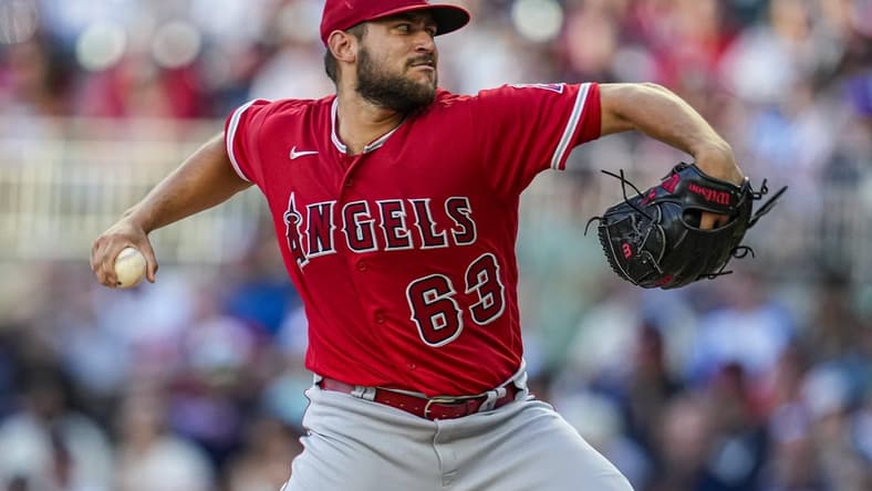 Jul 31, 2023; Cumberland, Georgia, USA; Los Angeles Angels starting pitcher Chase Silseth (63) pitches against the Atlanta Braves during the first inning at Truist Park. Mandatory Credit: Dale Zanine-USA TODAY Sports