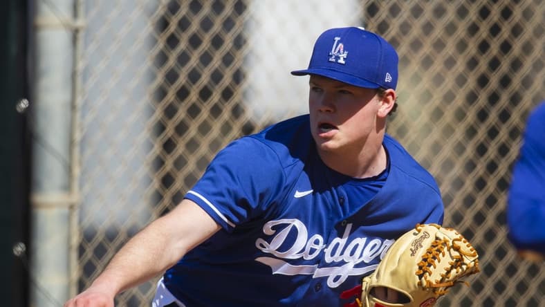 Feb 23, 2021; Glendale, Arizona, USA; Los Angeles Dodgers pitcher Gus Varland throws during Spring Training workouts at Camelback Ranch. Mandatory Credit: Mark J. Rebilas-USA TODAY Sports