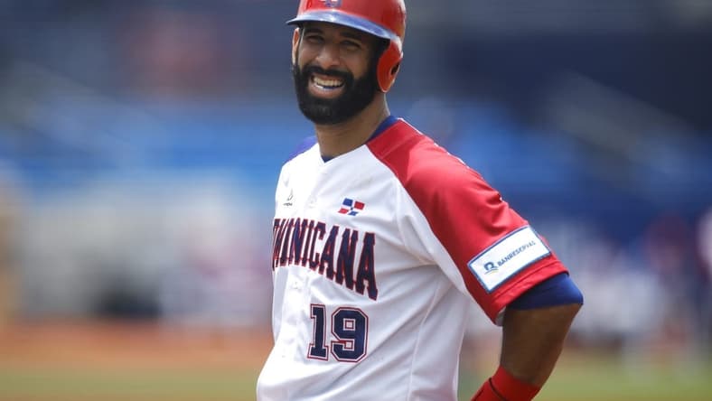 Jun 2, 2021; St. Lucie, Florida, USA; Dominican Republic first baseman Jose Bautista (19) reacts from first base against Nicaragua during the WBSC Baseball Americas Qualifier series at Clover Park. Mandatory Credit: Sam Navarro-USA TODAY Sports