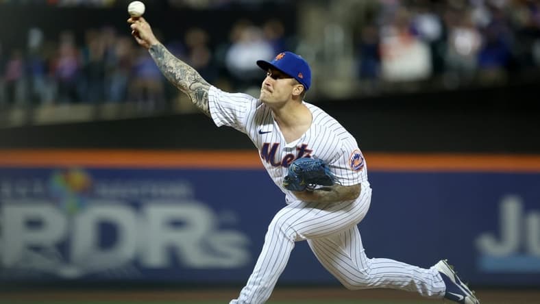 Apr 30, 2022; New York City, New York, USA; New York Mets relief pitcher Sean Reid-Foley (61) pitches against the Philadelphia Phillies during the seventh inning at Citi Field. Mandatory Credit: Brad Penner-USA TODAY Sports