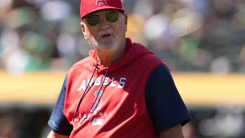 May 14, 2022; Oakland, California, USA; Los Angeles Angels manager Joe Maddon (70) walks to the dugout during the seventh inning against the Oakland Athletics at RingCentral Coliseum. Mandatory Credit: Darren Yamashita-USA TODAY Sports