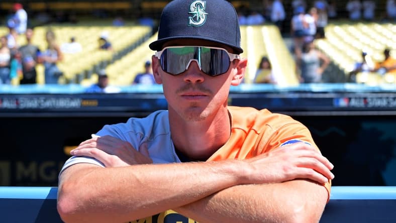 Jul 16, 2022; Los Angeles, CA, USA; American League Futures relief pitcher Emerson Hancock (17) looks on from the dugout before the All Star-Futures Game at Dodger Stadium. Mandatory Credit: Jayne Kamin-Oncea-USA TODAY Sports