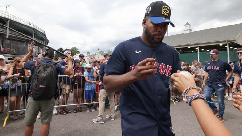 Boston Red Sox player Franchy Cordero signs autographs at the Little League World Series in South Williamsport, Pennsylvania, on Sunday, Aug. 21, 2022. The Red Sox and Baltimore Orioles played in the Little League Classic at Bowman Field on Sunday night.

CP 4