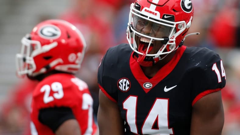 Georgia's Arik Gilbert (14) celebrates after making a touchdown catch during the G-Day spring game in Athens, Ga., on Saturday, April 16, 2022.

News Joshua L Jones

Syndication Online Athens