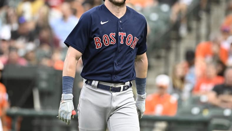 Sep 10, 2022; Baltimore, Maryland, USA;  Boston Red Sox second baseman Trevor Story (10) reacts to being hit by a pitch during the first inning against the Baltimore Orioles at Oriole Park at Camden Yards. Mandatory Credit: James A. Pittman-USA TODAY Sports