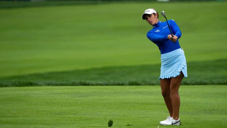 Ally Ewing watches her approach shot on hole two of the Kendale Course during the final round of the Kroger Queen City Championship presented by P&G at the Kenwood Country Club in Madeira on Sunday, Sept. 11, 2022.
Lpga Queen City Championship 0170