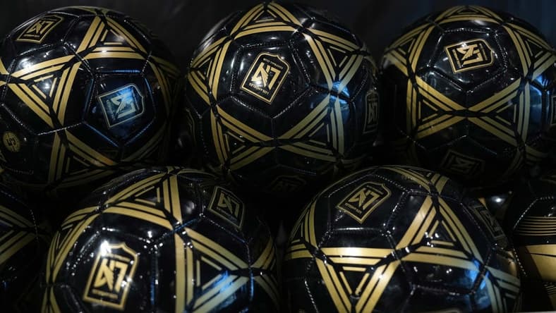 Nov 1, 2022; Los Angeles, California, USA; Los Angeles FC logo soccer balls at the LAFC HQ store at Banc of California Stadium. Mandatory Credit: Kirby Lee-USA TODAY Sports