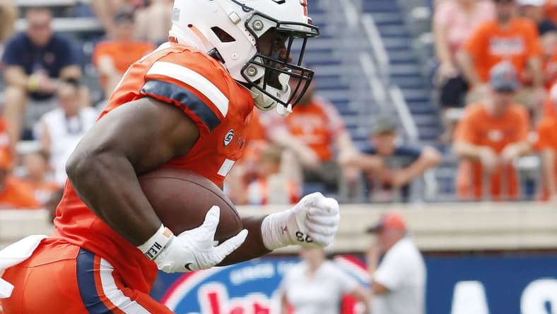Sep 3, 2022; Charlottesville, Virginia, USA; Virginia Cavaliers running back Mike Hollins (7) carries the ball during the first half against the Richmond Spiders at Scott Stadium. Mandatory Credit: Amber Searls-USA TODAY Sports