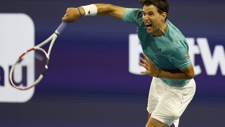 Mar 23, 2023; Miami, Florida, US; Dominic Thiem (AUT) serves against Lorenzo Sonego (ITA) (not pictured) on day four of the Miami Open at Hard Rock Stadium. Mandatory Credit: Geoff Burke-USA TODAY Sports