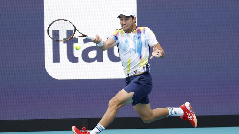 Mar 26, 2023; Miami, Florida, US; Dusan Lajovic (SRB) hits a forehand against Carlos Alcaraz (ESP) (not pictured) on day seven of the Miami Open at Hard Rock Stadium. Mandatory Credit: Geoff Burke-USA TODAY Sports