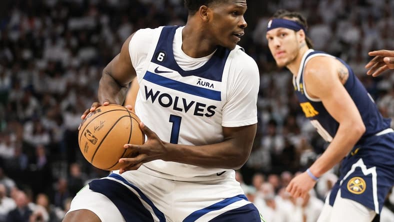 Apr 23, 2023; Minneapolis, Minnesota, USA; Minnesota Timberwolves guard Anthony Edwards (1) controls the ball against the Denver Nuggets during the fourth quarter of game four of the 2023 NBA Playoffs at Target Center. Mandatory Credit: Matt Krohn-USA TODAY Sports