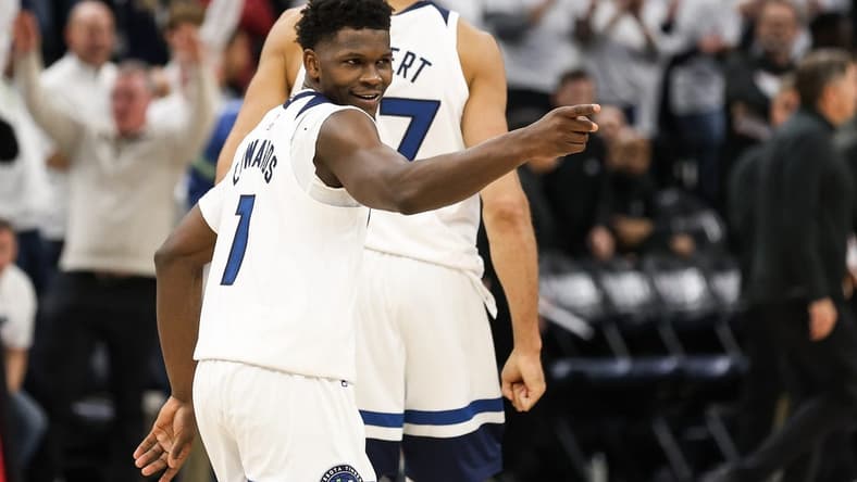 Apr 23, 2023; Minneapolis, Minnesota, USA; Minnesota Timberwolves guard Anthony Edwards (1) reacts to his shot against the Denver Nuggets during overtime of game four of the 2023 NBA Playoffs at Target Center. Mandatory Credit: Matt Krohn-USA TODAY Sports