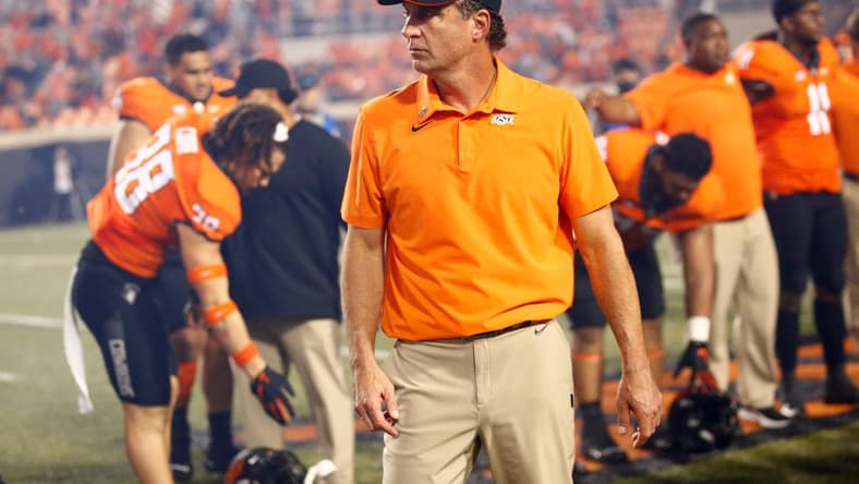 Oklahoma Sate football coach Mike Gundy waits to sing the alma mater following the college football game between Oklahoma State University Cowboys (OSU) and Baylor University Bears at Boone Pickens Stadium in Stillwater, Okla., Saturday, Oct. 2, 2021. OSU won 24-17.
gundy cover cutout
