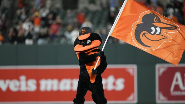 May 10, 2023; Baltimore, Maryland, USA; the Baltimore Orioles mascot waves a flag after a 2-1 victory over the Tampa Bay Rays at Oriole Park at Camden Yards. Mandatory Credit: Brent Skeen-USA TODAY Sports