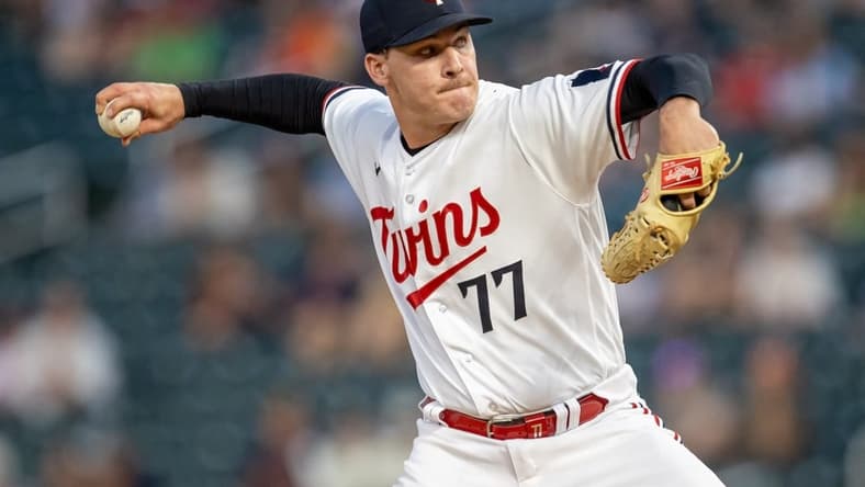 May 22, 2023; Minneapolis, Minnesota, USA; Minnesota Twins starting pitcher Cole Sands (77) delivers a pitch in the eighth inning against the San Francisco Giants at Target Field. Mandatory Credit: Jesse Johnson-USA TODAY Sports