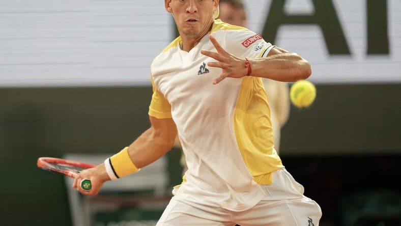 May 30, 2023; Paris,France; Sebastian Baez (ARG) returns a shot during his match against Gael Monfils (FRA) on day three at Stade Roland-Garros. Mandatory Credit: Susan Mullane-USA TODAY Sports