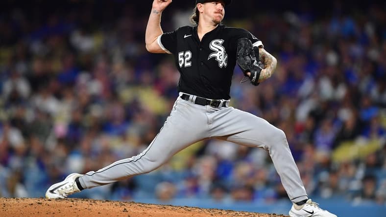 Jun 14, 2023; Los Angeles, California, USA; Chicago White Sox starting pitcher Mike Clevinger (52) throws against the Los Angeles Dodgers during the fourth inning at Dodger Stadium. Mandatory Credit: Gary A. Vasquez-USA TODAY Sports
