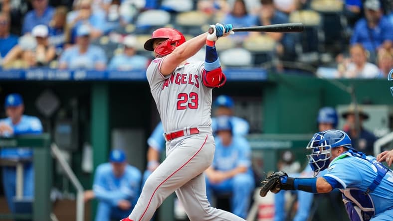 Jun 18, 2023; Kansas City, Missouri, USA; Los Angeles Angels first baseman Brandon Drury (23) hits an RBI single during the second inning against the Kansas City Royals at Kauffman Stadium. Mandatory Credit: Jay Biggerstaff-USA TODAY Sports