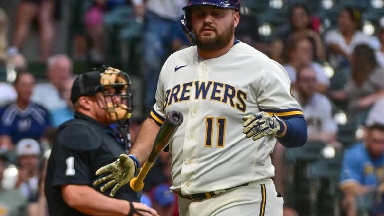 Jun 19, 2023; Milwaukee, Wisconsin, USA; Milwaukee Brewers first baseman Rowdy Tellez (11) reacts after striking out in the fifth inning against the Arizona Diamondbacks at American Family Field. Mandatory Credit: Benny Sieu-USA TODAY Sports
