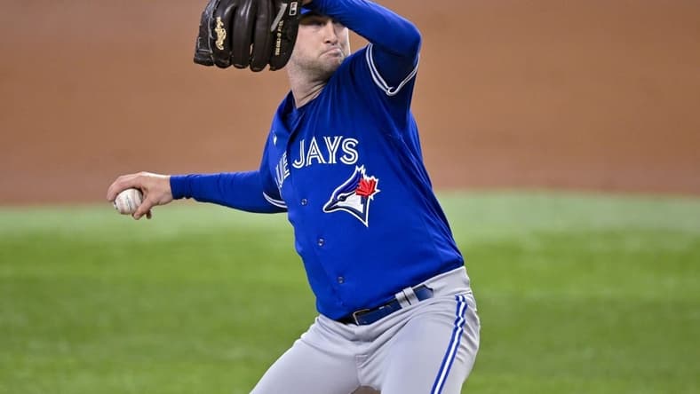 Jun 17, 2023; Arlington, Texas, USA; Toronto Blue Jays starting pitcher Trevor Richards (33) in action during the game between the Texas Rangers and the Toronto Blue Jays at Globe Life Field. Mandatory Credit: Jerome Miron-USA TODAY Sports