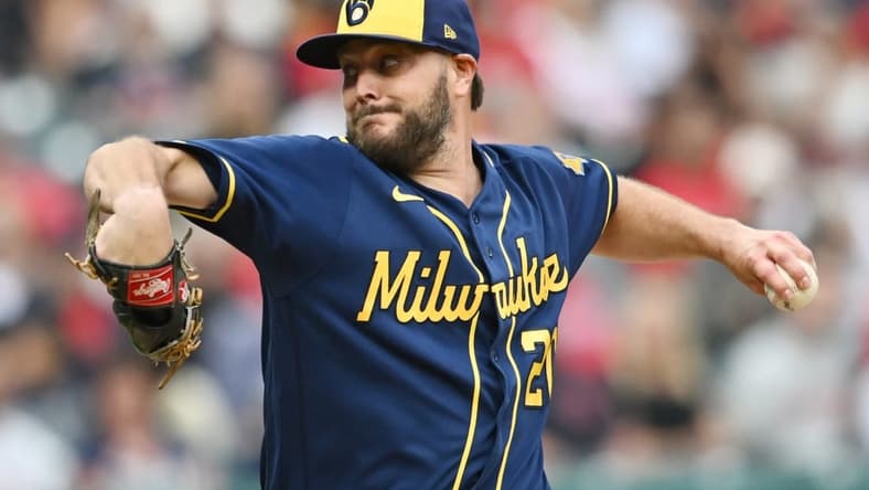 Jun 23, 2023; Cleveland, Ohio, USA; Milwaukee Brewers starting pitcher Wade Miley (20) throws a pitch during the first inning against the Cleveland Guardians at Progressive Field. Mandatory Credit: Ken Blaze-USA TODAY Sports