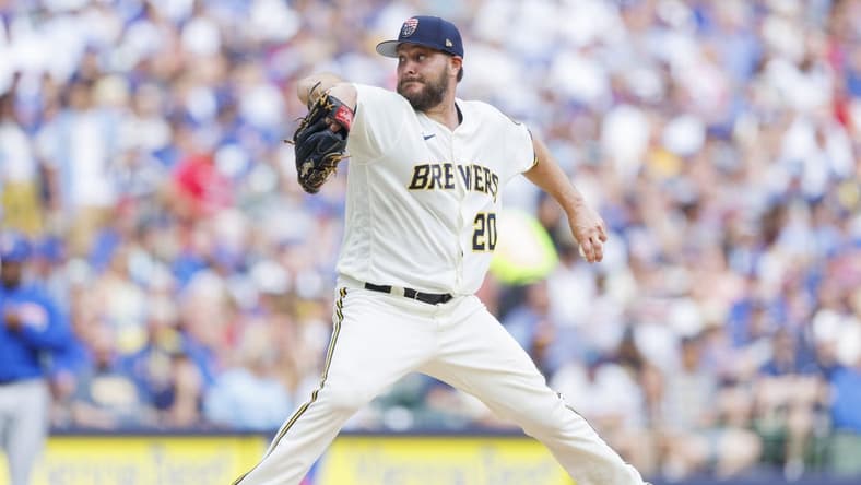 Jul 4, 2023; Milwaukee, Wisconsin, USA;  Milwaukee Brewers pitcher Wade Miley (20) throws a pitch during the third inning against the Chicago Cubs at American Family Field. Mandatory Credit: Jeff Hanisch-USA TODAY Sports