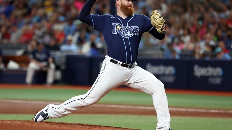 Jul 5, 2023; St. Petersburg, Florida, USA;  Tampa Bay Rays starting pitcher Zack Littell (52) throws a pitch against the Philadelphia Phillies during the second inning at Tropicana Field. Mandatory Credit: Kim Klement-USA TODAY Sports