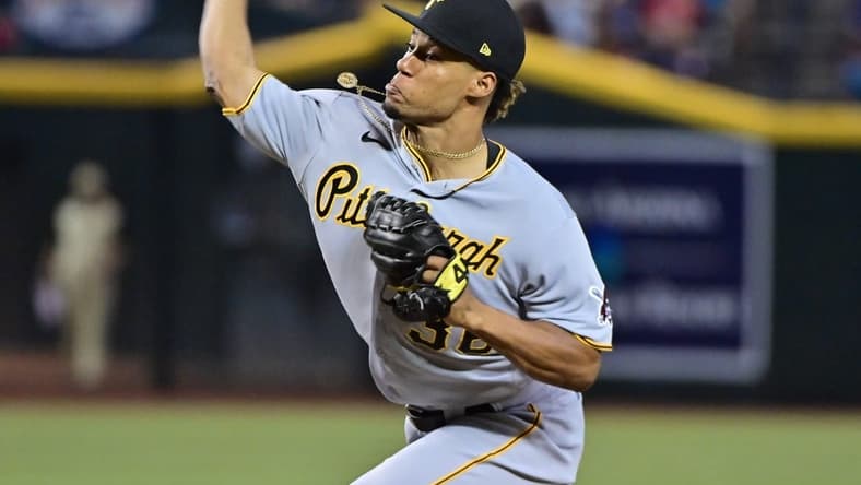 Jul 7, 2023; Phoenix, Arizona, USA; Pittsburgh Pirates relief pitcher Dauri Moreta (36) throws in the eighth inning against the Arizona Diamondbacks  at Chase Field. Mandatory Credit: Matt Kartozian-USA TODAY Sports