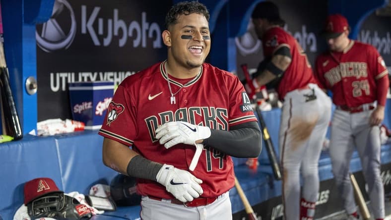 Jul 14, 2023; Toronto, Ontario, CAN; Arizona Diamondbacks catcher Gabriel Moreno (14) celebrates after hitting a home run against the Toronto Blue Jays during the seventh inning at Rogers Centre. Mandatory Credit: Kevin Sousa-USA TODAY Sports