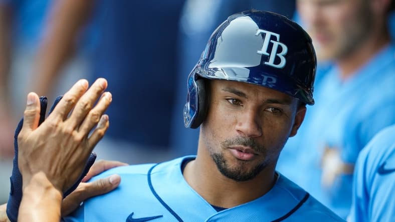 Jul 15, 2023; Kansas City, Missouri, USA; Tampa Bay Rays catcher Francisco Mejia (21) is congratulated by teammates after hitting a home run during the fifth inning against the Kansas City Royals at Kauffman Stadium. Mandatory Credit: Jay Biggerstaff-USA TODAY Sports