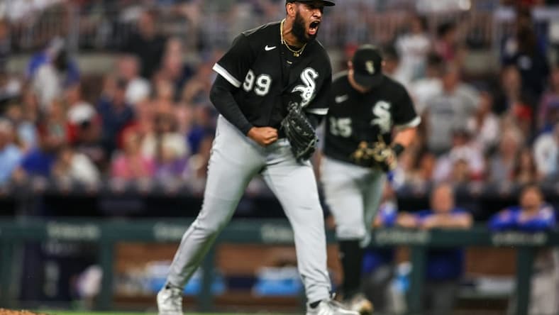Jul 15, 2023; Atlanta, Georgia, USA; Chicago White Sox relief pitcher Keynan Middleton (99) reacts after an out against the Atlanta Braves in the eighth inning at Truist Park. Mandatory Credit: Brett Davis-USA TODAY Sports