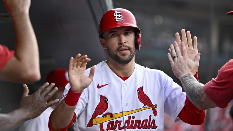 Jul 17, 2023; St. Louis, Missouri, USA; St. Louis Cardinals center fielder Dylan Carlson (3) is congaratulated by teammates after scoring against the Miami Marlins during the third inning at Busch Stadium. Mandatory Credit: Jeff Curry-USA TODAY Sports