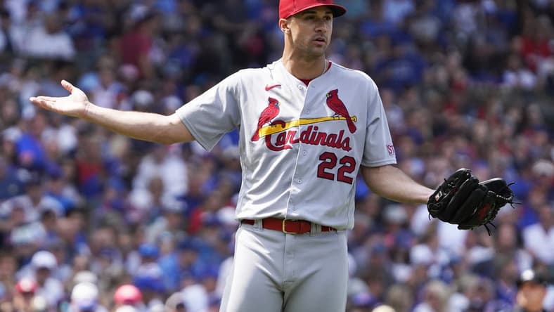Jul 21, 2023; Chicago, Illinois, USA; St. Louis Cardinals starting pitcher Jack Flaherty (22) questions a pitch clock violation against the Chicago Cubs during the sixth inning at Wrigley Field. Mandatory Credit: David Banks-USA TODAY Sports
