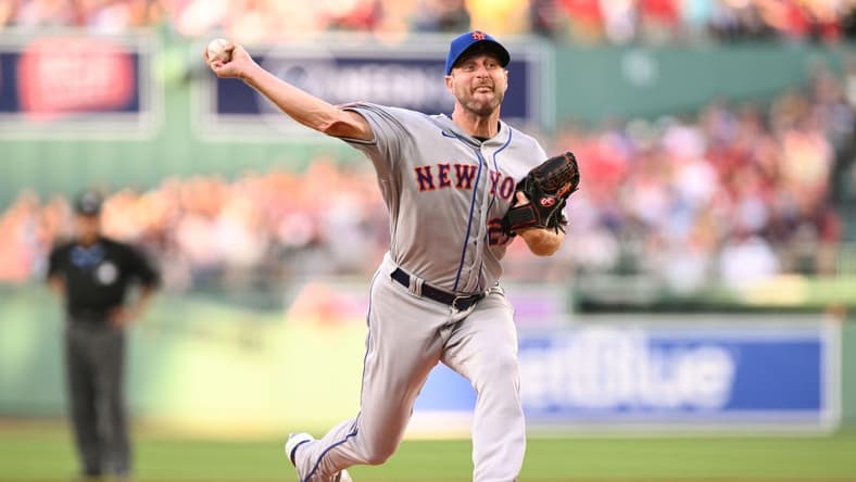 Jul 22, 2023; Boston, Massachusetts, USA; New York Mets starting pitcher Max Scherzer (21) pitches against the Boston Red Sox during the first inning at Fenway Park. Mandatory Credit: Brian Fluharty-USA TODAY Sports