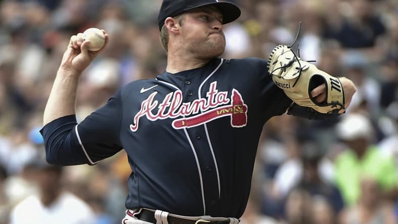 Jul 23, 2023; Milwaukee, Wisconsin, USA; Atlanta Braves pitcher Bryce Elder (55) pitches against the Milwaukee Brewers in the first inning at American Family Field. Mandatory Credit: Benny Sieu-USA TODAY Sports