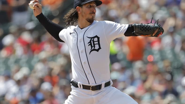 Jul 27, 2023; Detroit, Michigan, USA;  Detroit Tigers starting pitcher Michael Lorenzen (21) pitches in the fourth inning against the Los Angeles Angels at Comerica Park. Mandatory Credit: Rick Osentoski-USA TODAY Sports