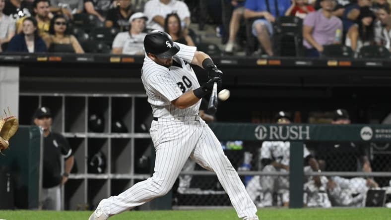Jul 27, 2023; Chicago, Illinois, USA; Chicago White Sox third baseman Jake Burger (30) hits a two-run home run against the Cleveland Guardians during the fifth inning at Guaranteed Rate Field. Mandatory Credit: Matt Marton-USA TODAY Sports