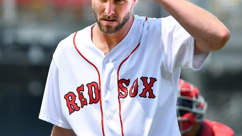 Boston Red Sox ace Chris Sale adjusts his cap after pitching a simulated inning at Polar Park.