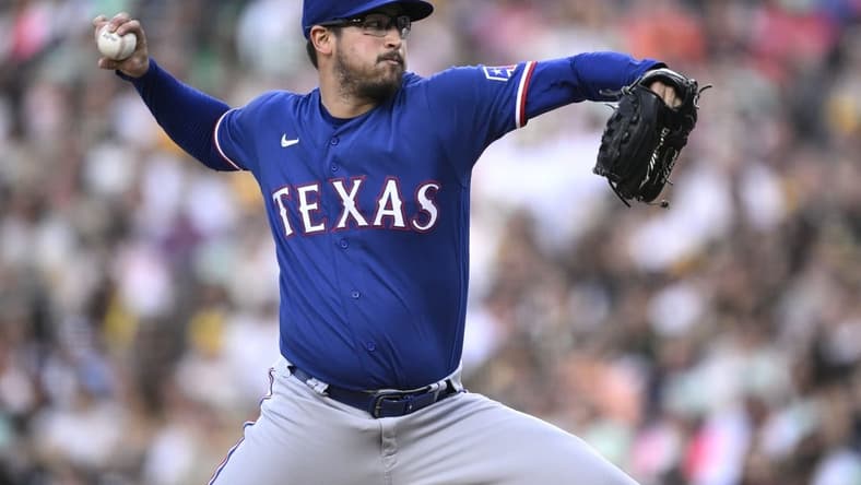Jul 28, 2023; San Diego, California, USA; Texas Rangers starting pitcher Dane Dunning (33) throws a pitch against the San Diego Padres during the first inning at Petco Park. Mandatory Credit: Orlando Ramirez-USA TODAY Sports