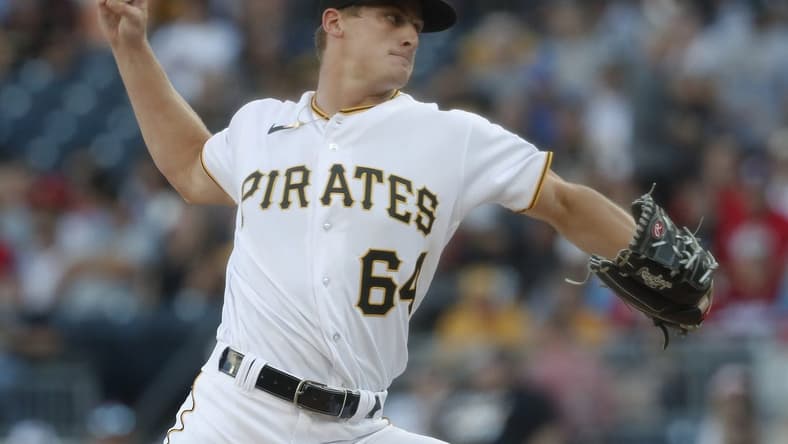 Jul 29, 2023; Pittsburgh, Pennsylvania, USA;  .Pittsburgh Pirates starting pitcher Quinn Priester (64) delivers a pitch against the Philadelphia Phillies during the first inning at PNC Park. Mandatory Credit: Charles LeClaire-USA TODAY Sports