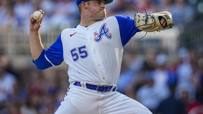Jul 29, 2023; Cumberland, Georgia, USA; Atlanta Braves starting pitcher Bryce Elder (55) pitches against the Milwaukee Brewers during the first inning at Truist Park. Mandatory Credit: Dale Zanine-USA TODAY Sports