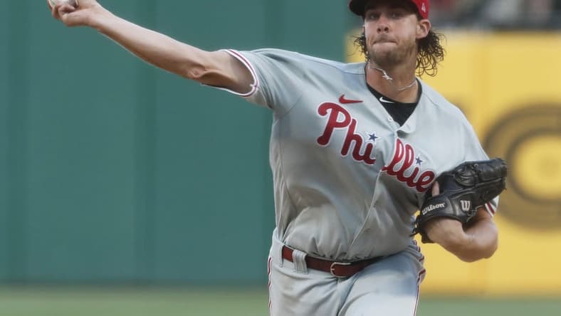 Jul 29, 2023; Pittsburgh, Pennsylvania, USA;  Philadelphia Phillies starting pitcher Aaron Nola (27) throws against the Pittsburgh Pirates during the third inning at PNC Park. Mandatory Credit: Charles LeClaire-USA TODAY Sports