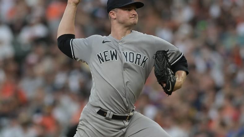 Jul 29, 2023; Baltimore, Maryland, USA;  New York Yankees starting pitcher Clarke Schmidt throws a second-inning pitch against the Baltimore Orioles at Oriole Park at Camden Yards. Mandatory Credit: Tommy Gilligan-USA TODAY Sports