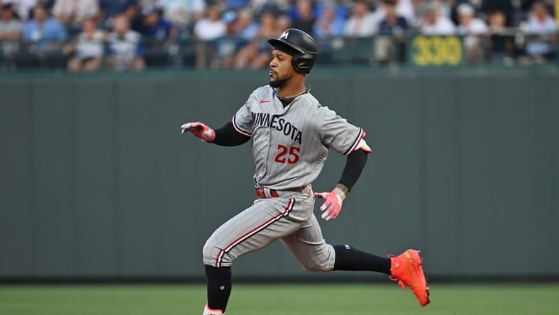 Jul 29, 2023; Kansas City, Missouri, USA; Minnesota Twins designated hitter Byron Buxton (25) doubles during the sixth inning against the Kansas City Royals at Kauffman Stadium. Mandatory Credit: Peter Aiken-USA TODAY Sports