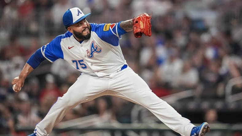 Jul 29, 2023; Cumberland, Georgia, USA; Atlanta Braves relief pitcher Daysbel Hernandez (75) pitches against the Milwaukee Brewers during the eighth inning at Truist Park. Mandatory Credit: Dale Zanine-USA TODAY Sports