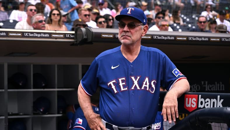 Jul 30, 2023; San Diego, California, USA; Texas Rangers manager Bruce Bochy looks on from the dugout steps before the game against the San Diego Padres at Petco Park. Mandatory Credit: Orlando Ramirez-USA TODAY Sports